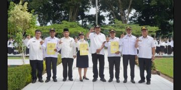 Plt Bupati Langkat Syah Afandin Serahkan SK PPPK Guru dan Terima Audiensi Sinode GEPKIN