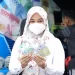 Warga Medan Diedukasi Terkait QRIS dan Penukaran Uang Baru Emisi 2022