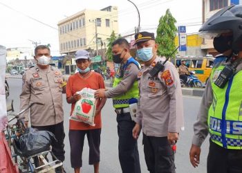 Polsek Percut Sei Tuan Melaksanakan Kegiatan Bakti Sosial