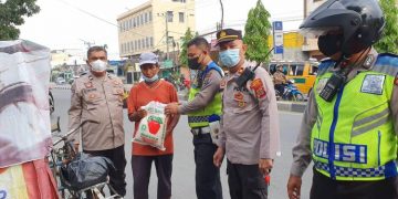 Polsek Percut Sei Tuan Melaksanakan Kegiatan Bakti Sosial