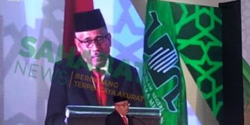 Drs. Basarin Yunus Tanjung, MSi saat membacakan Amanat Pj Gubernur Sumut pada kegiatan Dies Natalis ke 50 dan Wisuda Sarjana UIN SU ke 81