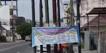 Spanduk Tarif Parkir Konvensional Bermunculan, Warga: Kebijakan Aneh Bin Ajaib